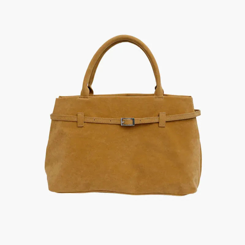 Tan handbag with a belt detail on a white background