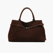 Brown handbag on a white background