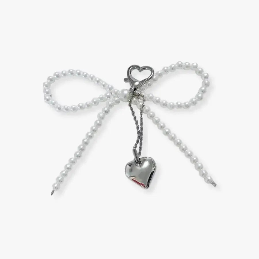 vera_marne_luxury_bag_pearl_bow_heart_keychain_charm_feminine_bag_accessory.webp